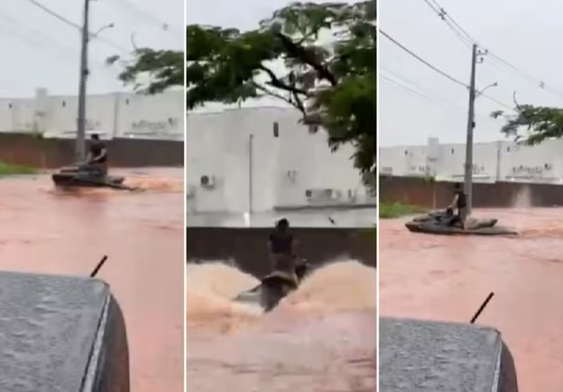 Após forte chuva, morador usa moto aquática em rua alagada de Araguaína