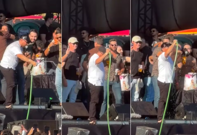 Henrique e Xand Avião se refrescam com banho no palco para driblar calor em show em Palmas